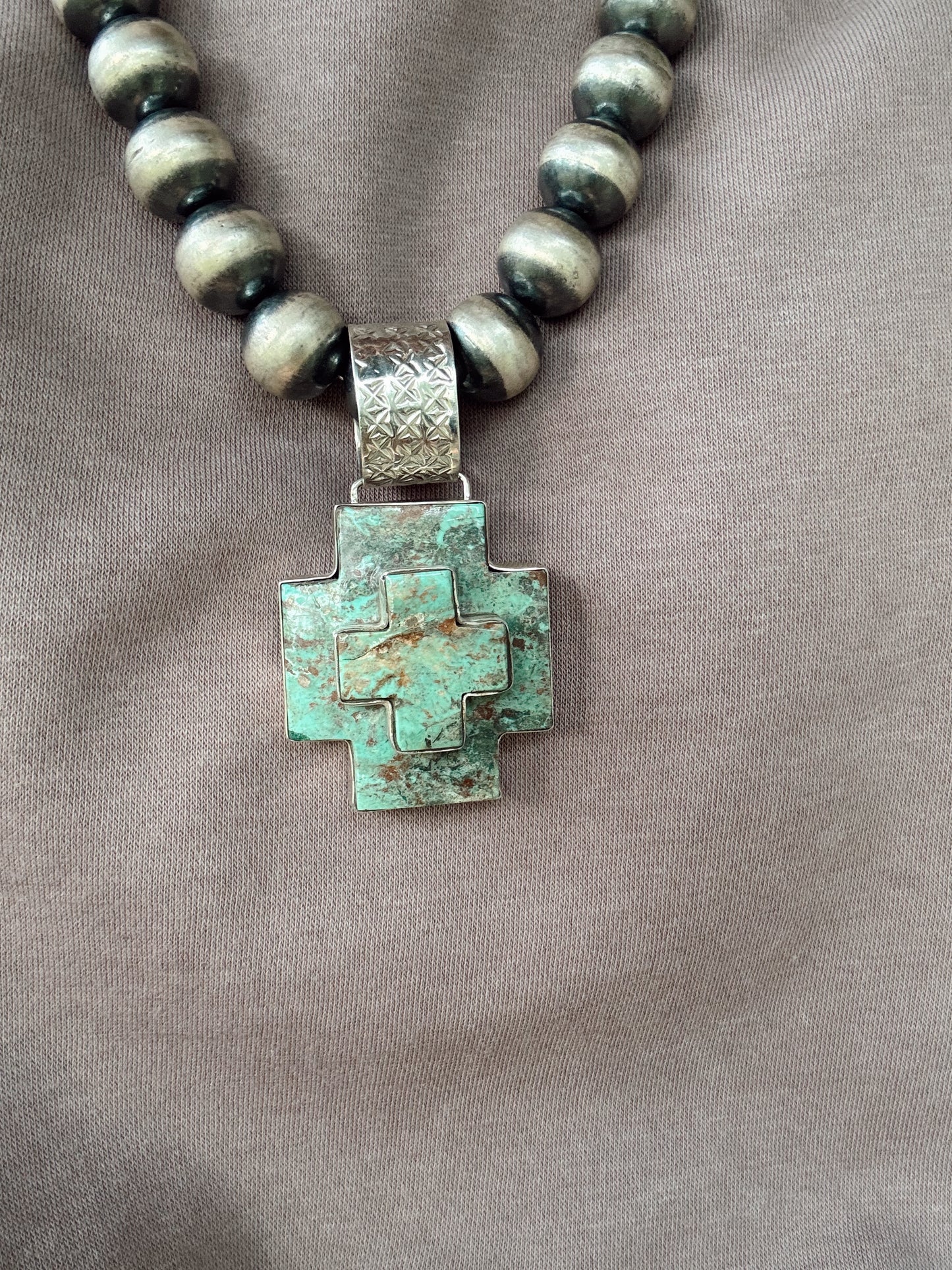 The Cosmos Cross Pendent